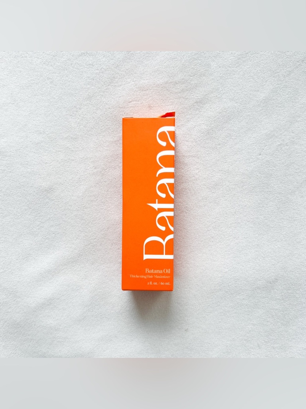Batana Oil Hair Treatment - Bright Orange Packaging